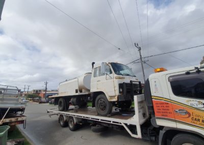 Tow truck towing a truck. Perth Towing and Tow Truck Services