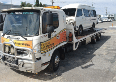 Tow truck towing a mini bus. Perth Towing and Tow Truck Services